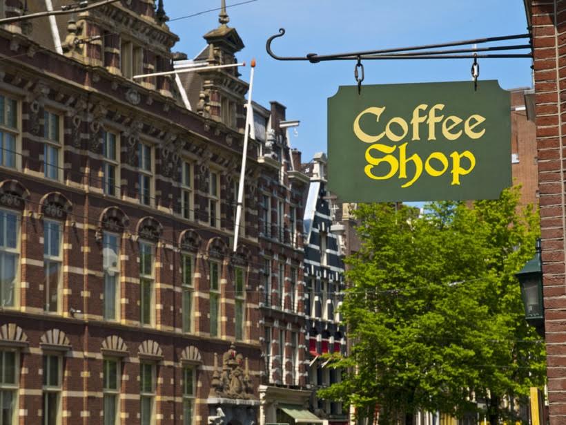 Tips for visiting Amsterdam coffee shops. Coffee shop sign