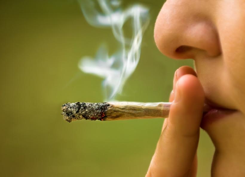 Top U.S. Locations For Smoking Marijuana. Women smoking a joint.