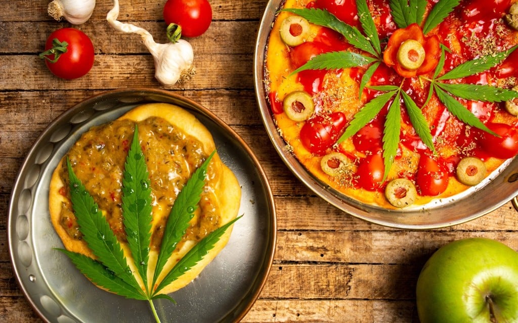 Top Marijuana Snacks. Pizza with pot leaves on it.