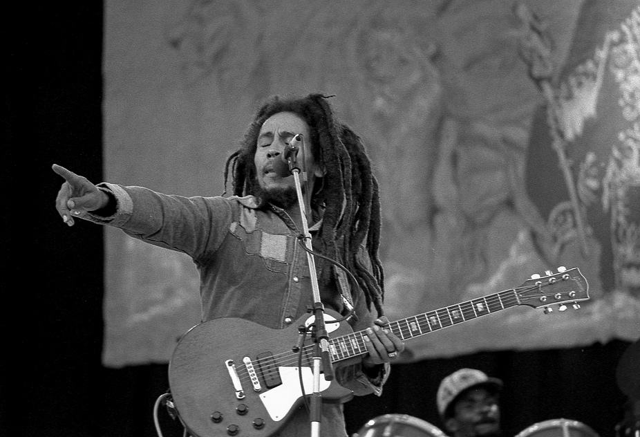 Bob Marley on stage with guitar