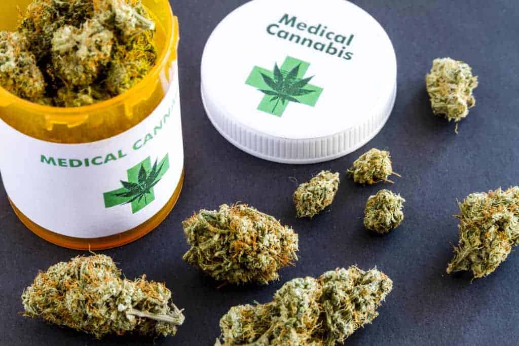 cannabis buds in a pill bottle, benefits of obtaining a medical cannabis card